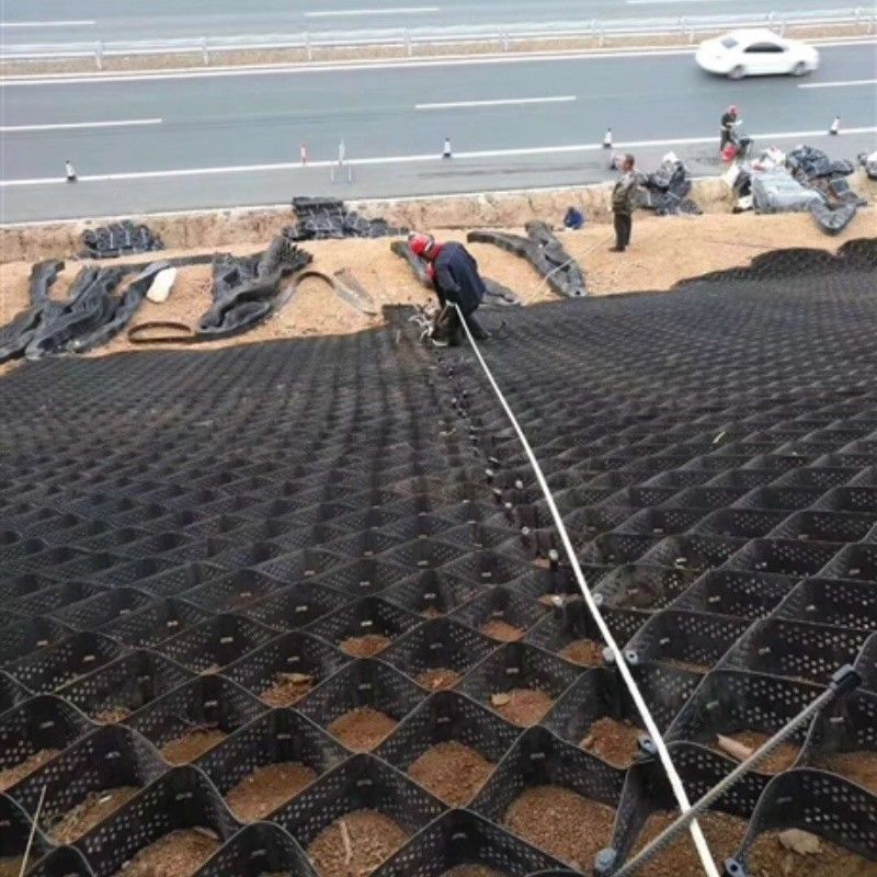 Υψηλό μέλιτο Μαύρο HDPE Geocell Reinforcement Driveway Για οδικά οδοστρώματα Σταθεροποιητής χαλίκις Δίκτυο Στήριξης Τείχους