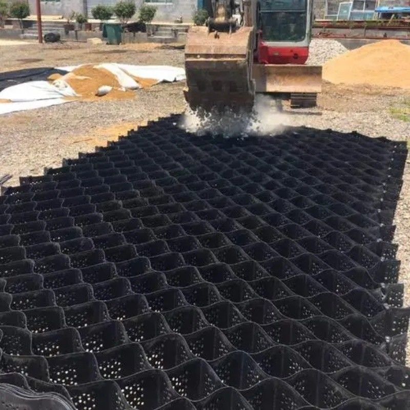 Υψηλό μέλιτο Μαύρο HDPE Geocell Reinforcement Driveway Για οδικά οδοστρώματα Σταθεροποιητής χαλίκις Δίκτυο Στήριξης Τείχους