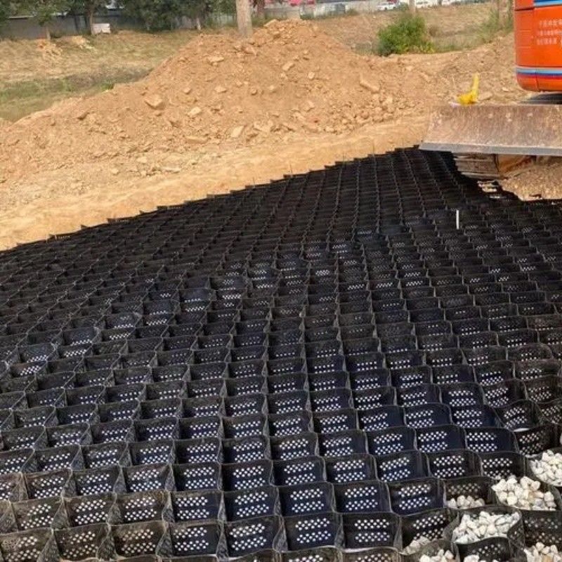 Υψηλό μέλιτο Μαύρο HDPE Geocell Reinforcement Driveway Για οδικά οδοστρώματα Σταθεροποιητής χαλίκις Δίκτυο Στήριξης Τείχους