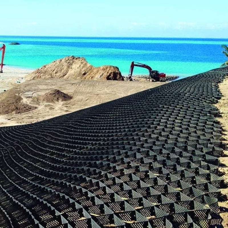 Υφασμένο με τρύπες HDPE Geocell Υψηλό κυτταρικό σύστημα περιορισμού Honeycomb HDPE Geocell για οδικές βάσεις Προστασία κλίσης Πάρκινγκ Οδική οδική οδός Στερεό τοίχος