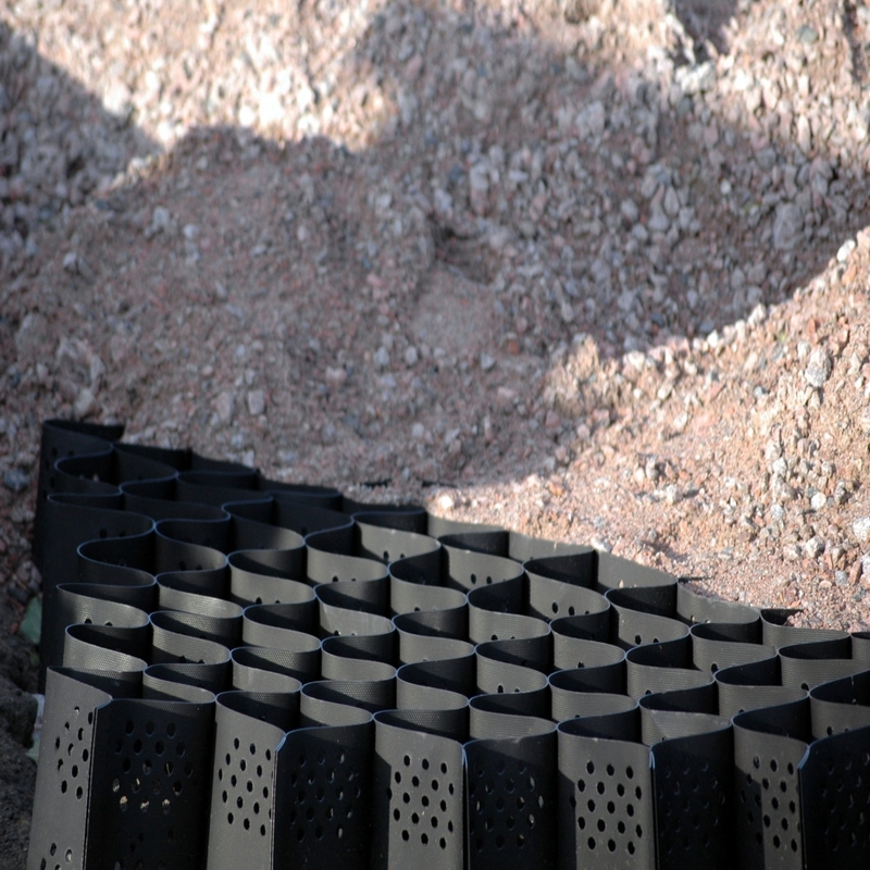 Υφασμένο με τρύπες HDPE Geocell Υψηλό κυτταρικό σύστημα περιορισμού Honeycomb HDPE Geocell για οδικές βάσεις Προστασία κλίσης Πάρκινγκ Οδική οδική οδός Στερεό τοίχος