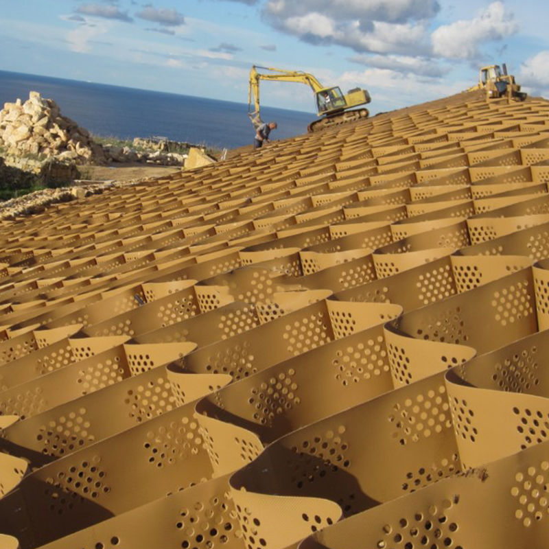 Δομημένο και διάτρητο πλαστικό γεωκυψελωτό πλέγμα HDPE για σταθεροποίηση δρόμων, ενίσχυση βάσης οδοστρώματος, χώρους στάθμευσης και προστασία πρανών